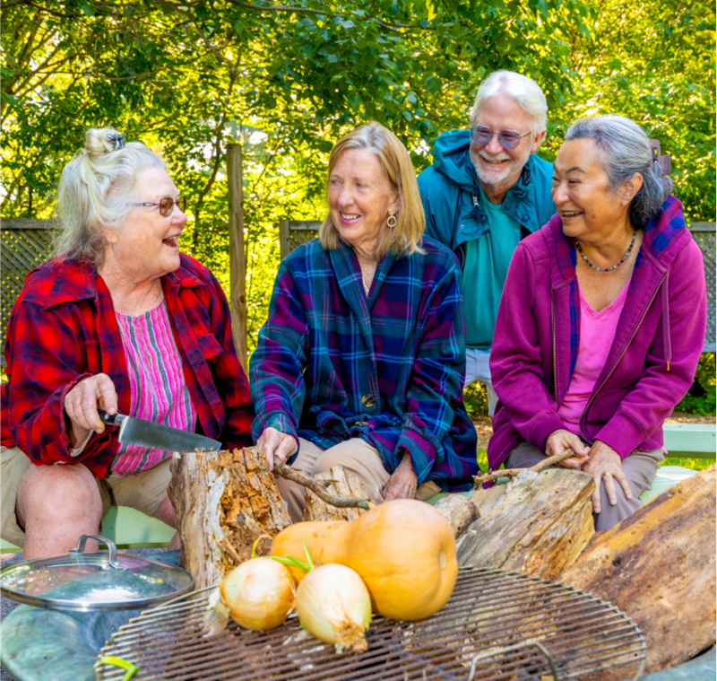 LLI Members around a campfire